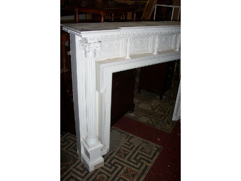 Appraisal: A substantial th century painted fire surround with ionic column