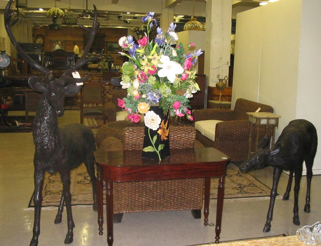 Appraisal: TWO PATINATED BRONZE WILDLIFE SCULPTURE stag and doe together cast