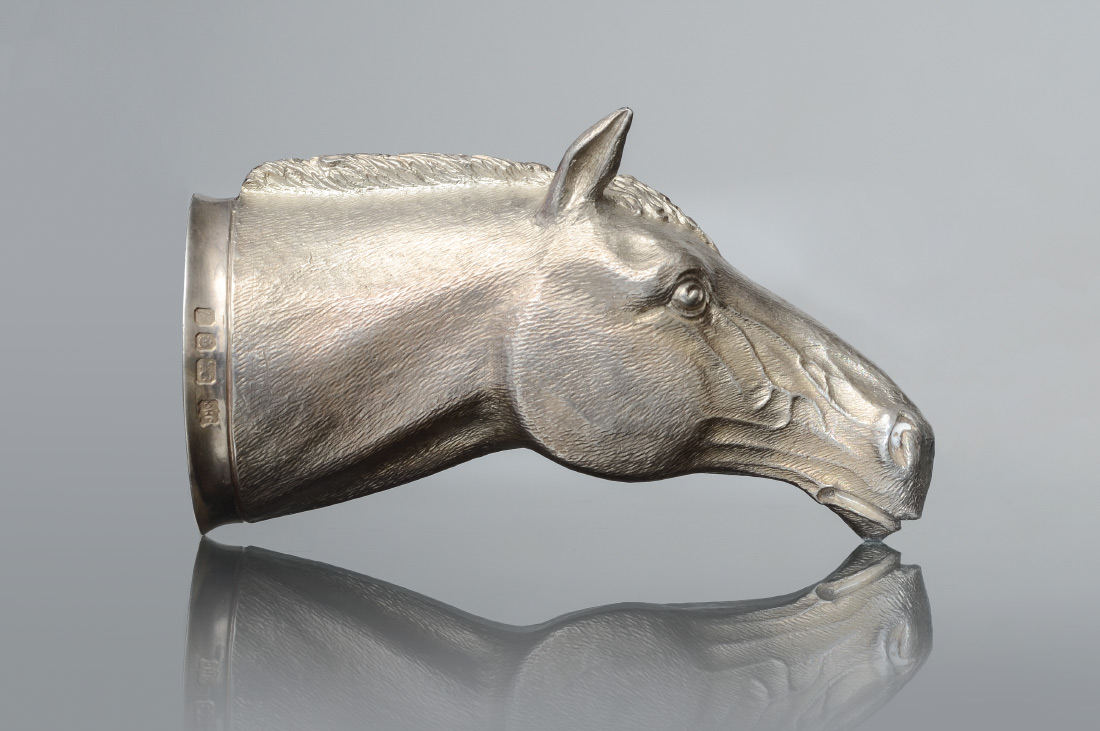 Appraisal: ENGLISH FIGURAL HORSE STERLING STIRRUP CUP In the form of