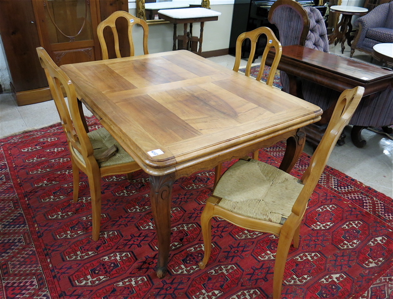 Appraisal: COUNTRY FRENCH DINING TABLE AND SIX CHAIRS Continental late th