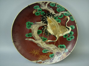 Appraisal: A th century Japanese pottery charger on ochre ground and