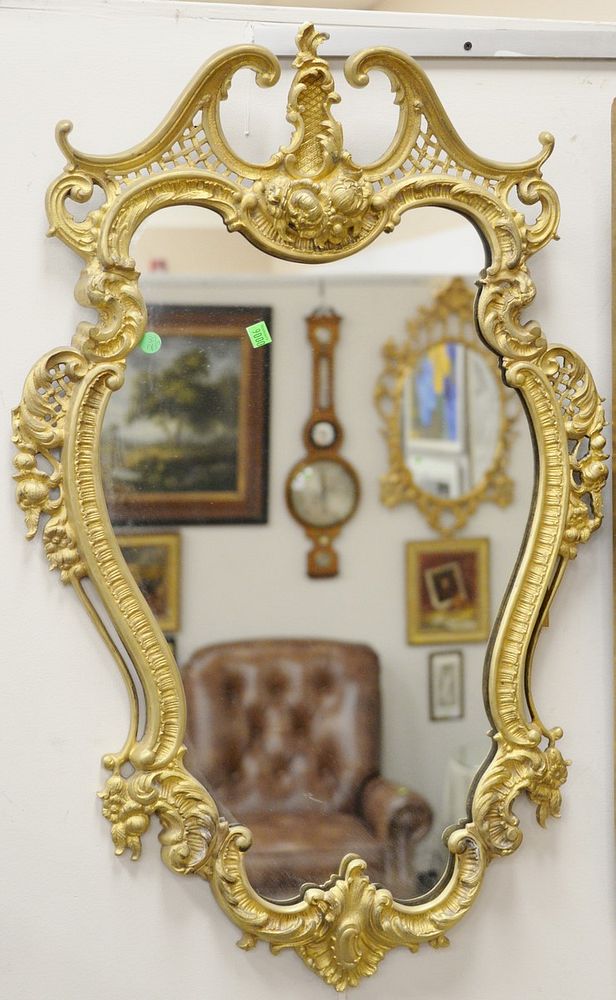 Appraisal: Pair of French Louis XV style dore bronze framed mirrors