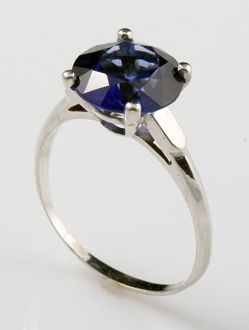 Appraisal: KW mm round blue sapphire Approx cts gms Ship plus