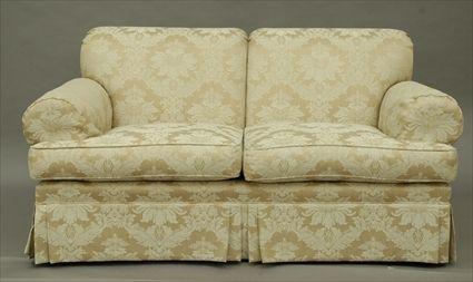 Appraisal: Two Ivory Upholstered Sofas Largest x x in