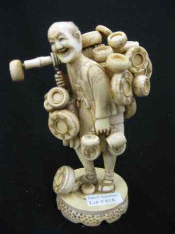 Appraisal: Chinese Carved Ivory Figurine of a Merchant happy man peddling