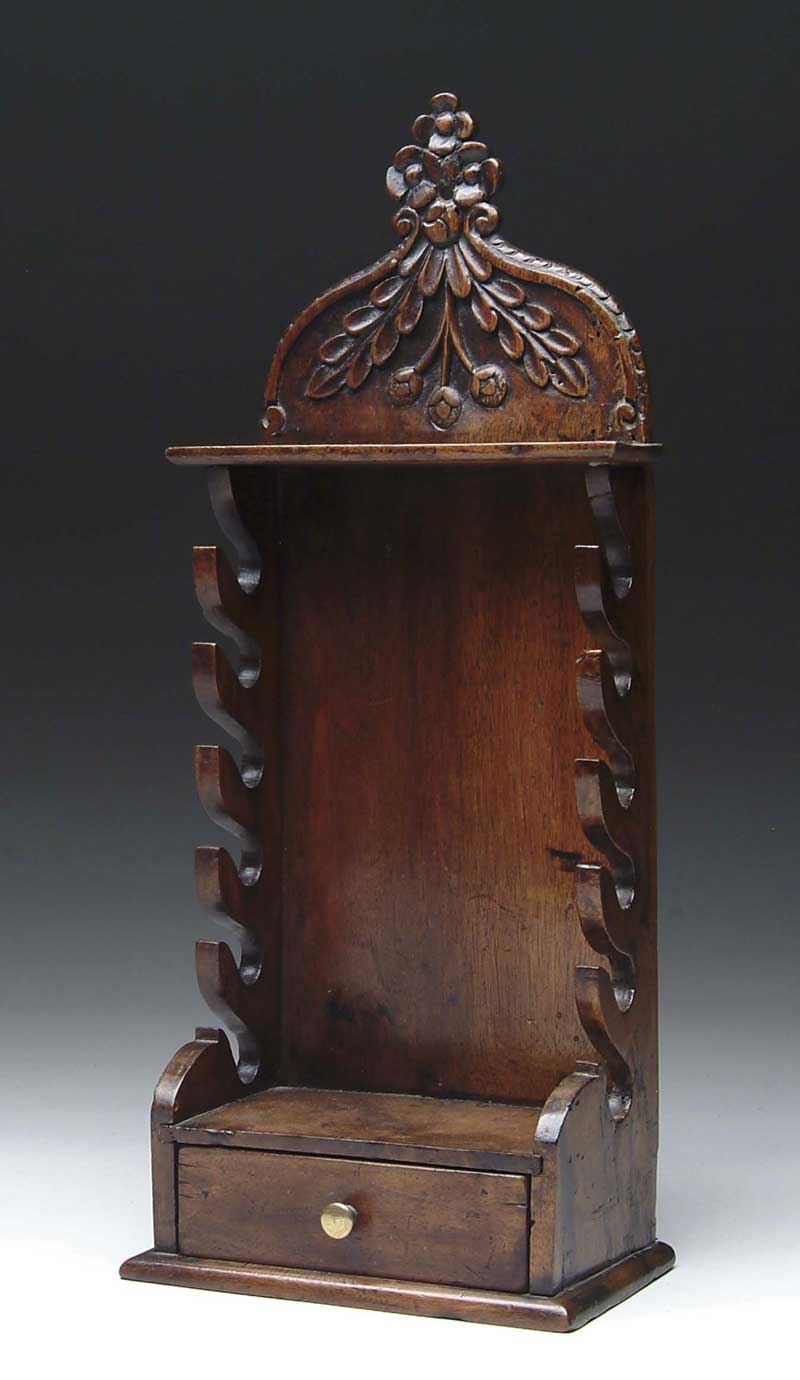 Appraisal: FRENCH CARVED WALL HANGING PIPE RACK th century Small dovetailed