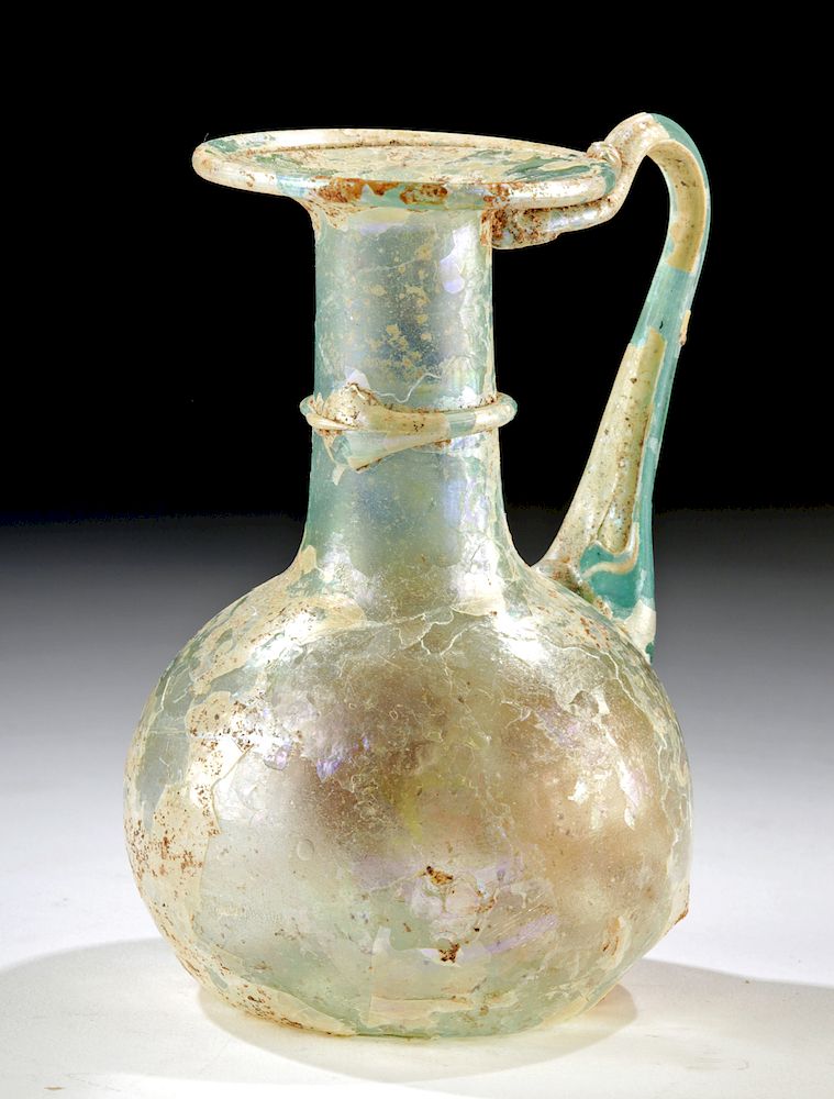 Appraisal: Beautiful Roman Glass Pitcher w Beautiful Iridescence Roman Imperial Period