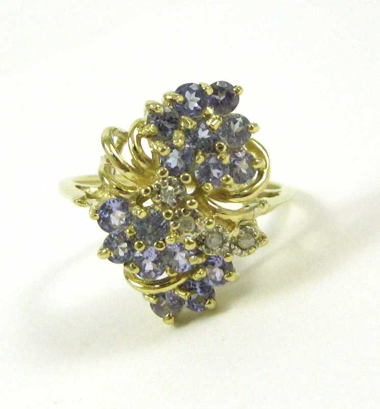 Appraisal: TANZANITE DIAMOND AND TEN KARAT GOLD RING set with a