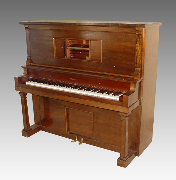 Appraisal: MAHOGANY CASE GILBERT PLAYER PIANO WITH APPROX ROLLS The W