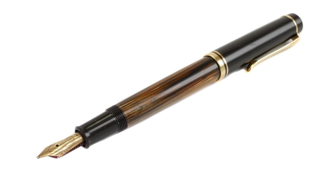 Appraisal: PELIKAN tortoise brown-striped K gold M nib fountain pen Nib