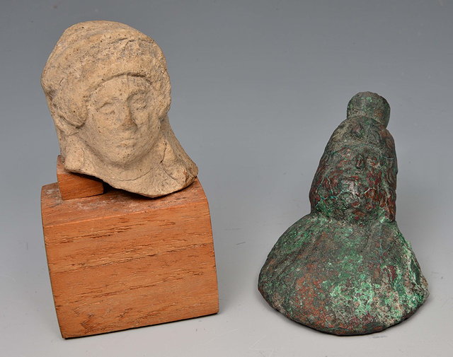 Appraisal: A ROMAN TERRACOTTA FRAGMENT of a female head cm high