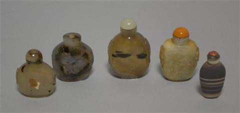 Appraisal: FOUR CHINESE AGATE SNUFF BOTTLES th century and later the