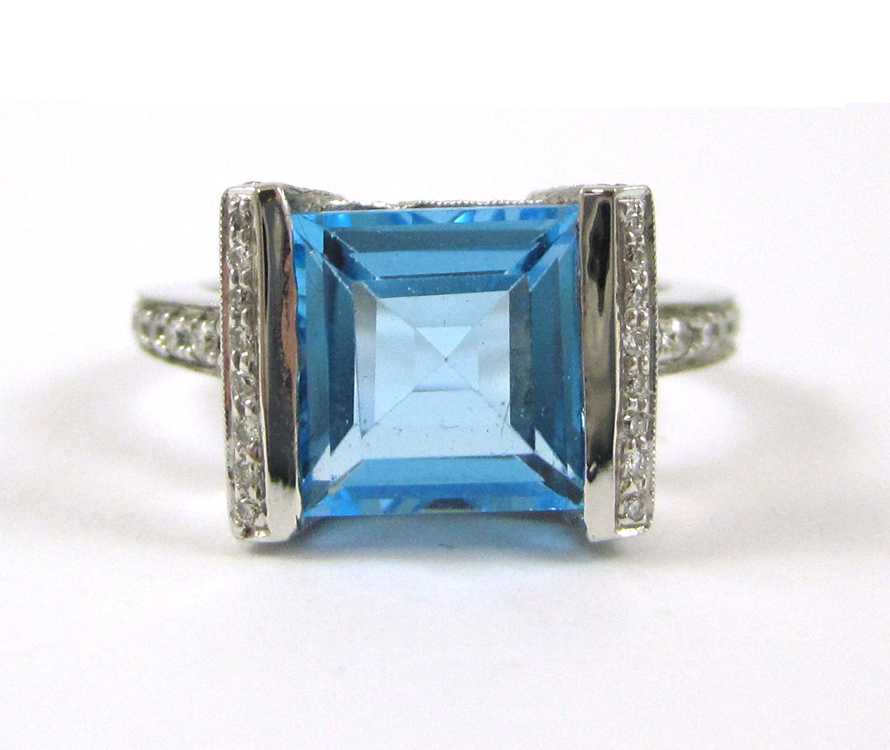 Appraisal: BLUE TOPAZ DIAMOND AND WHITE GOLD RING The k white