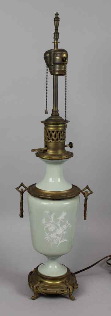 Appraisal: CONTINENTAL GILT BRONZE MOUNTED PATE-SUR-PATE OIL LAMP possibly Limoges with