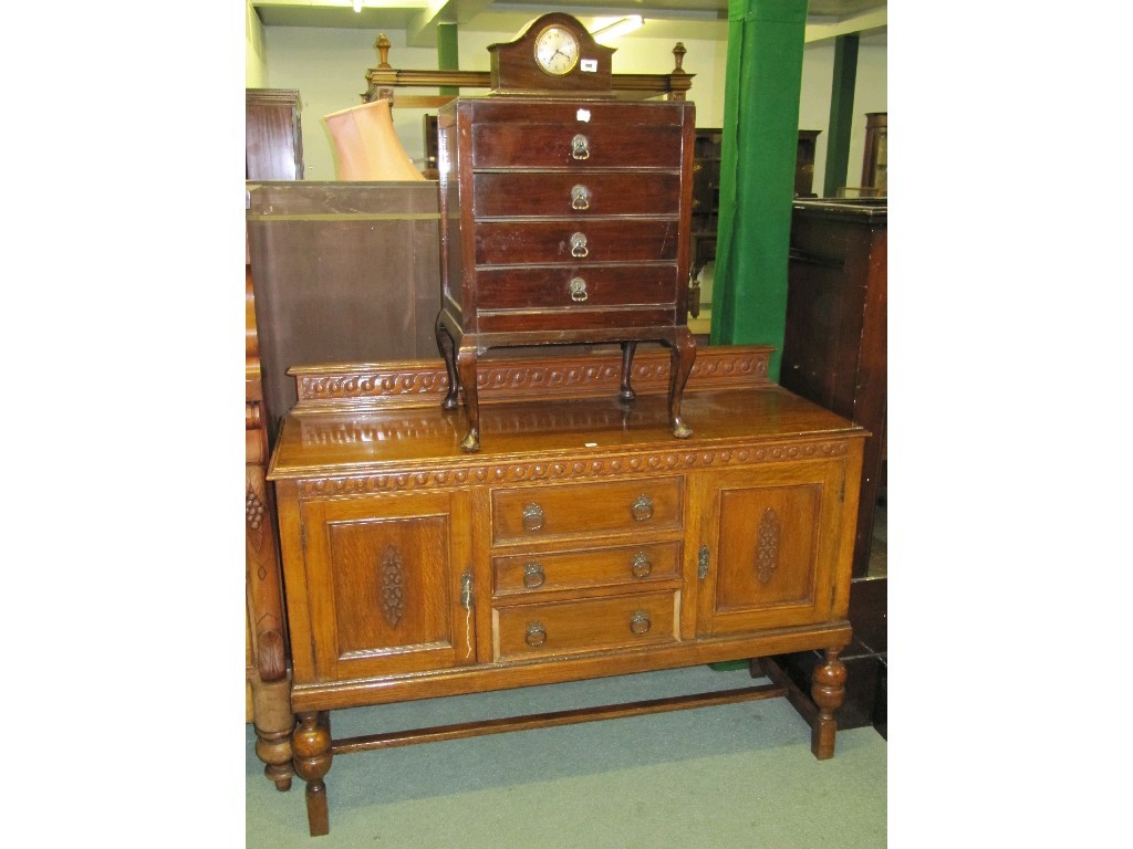 Appraisal: Lot comprising mantle clock music cabinet and an oak sideboard