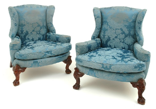 Appraisal: A PAIR OF GEORGE II STYLE WINGBACK ARMCHAIRS Each with