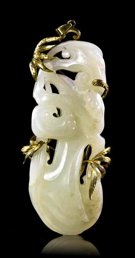 Appraisal: A Chinese Yellow Gold Mounted Jade Yellow Gold Mounted Toggle