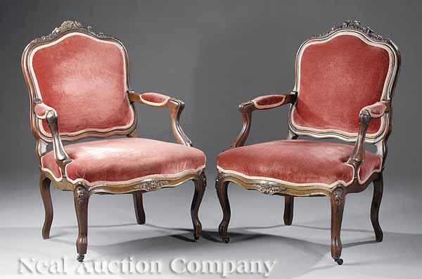 Appraisal: A Pair of Antique Louis XV-Style Carved Fruitwood Fauteuils c