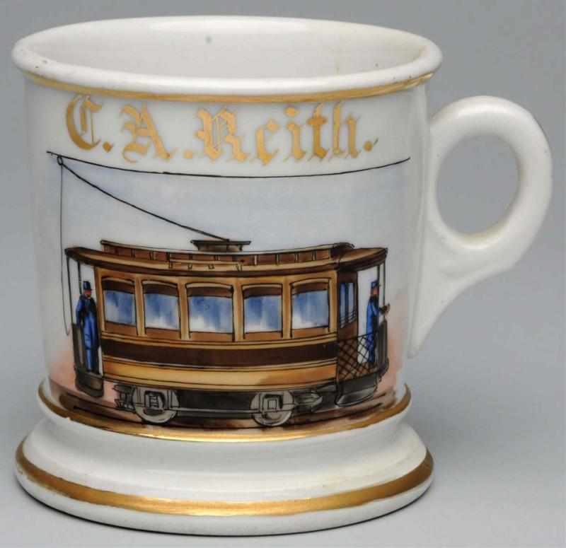 Appraisal: Trolley Car Shaving Mug Gilt name C A Reith Stamped