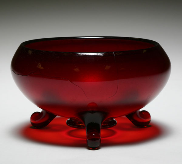 Appraisal: Fenton red stretch glass three-footed cup bowl