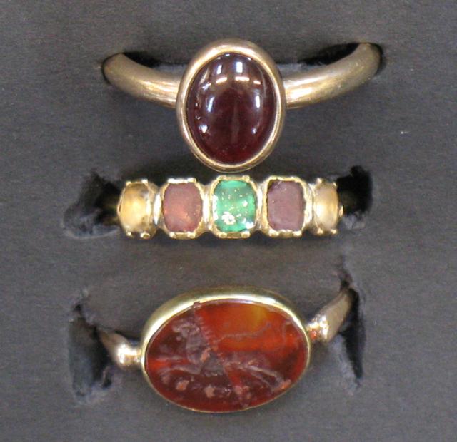 Appraisal: THREE TH CENTURY DRESS RINGS including a hardstone intaglio seal