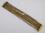 Appraisal: An antique carat gold seven strand bracelet one strand broken