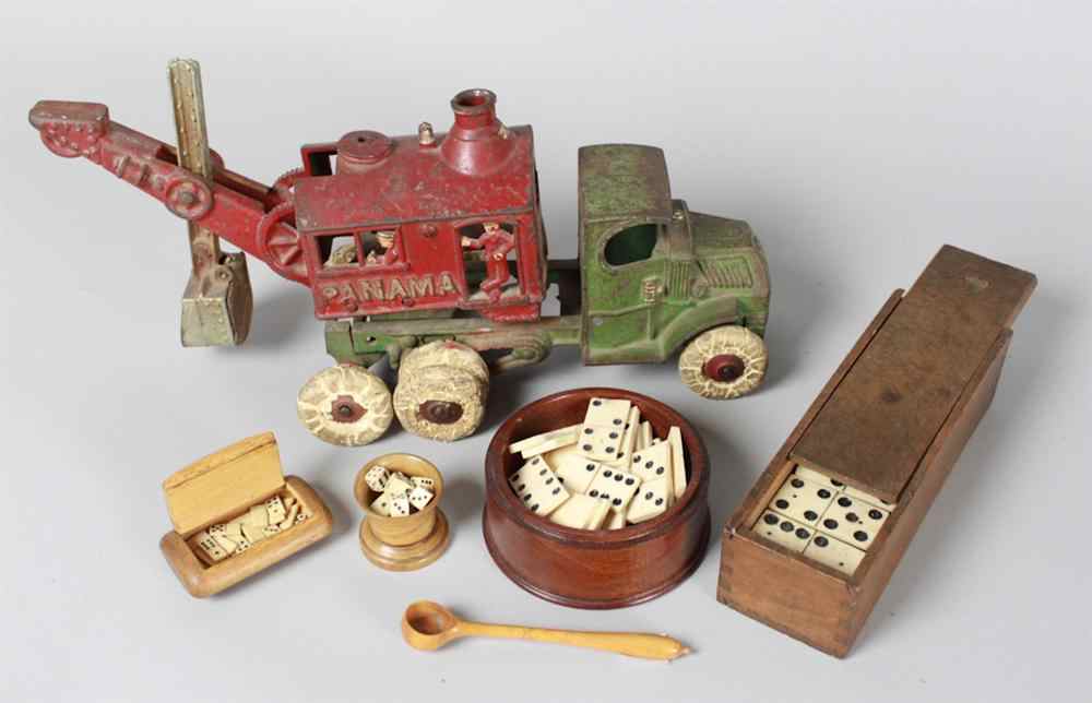 Appraisal: TOY METAL TRUCK FOUR WOODEN CONTAINERS BONE DOMINOES DICE AND