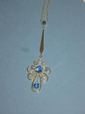 Appraisal: A SAPPHIRE AND DIAMOND PENDANT the open work ct gold