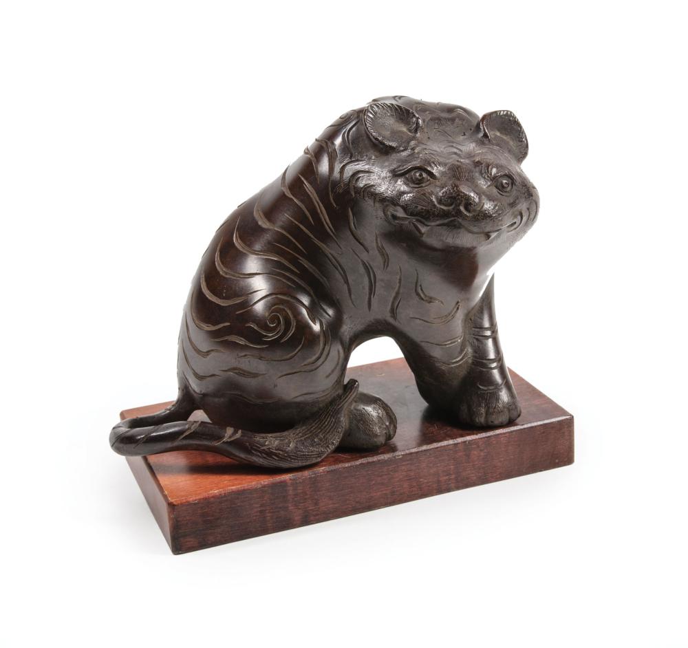 Appraisal: Asian Patinated Bronze Figure of a Tiger modeled seated on