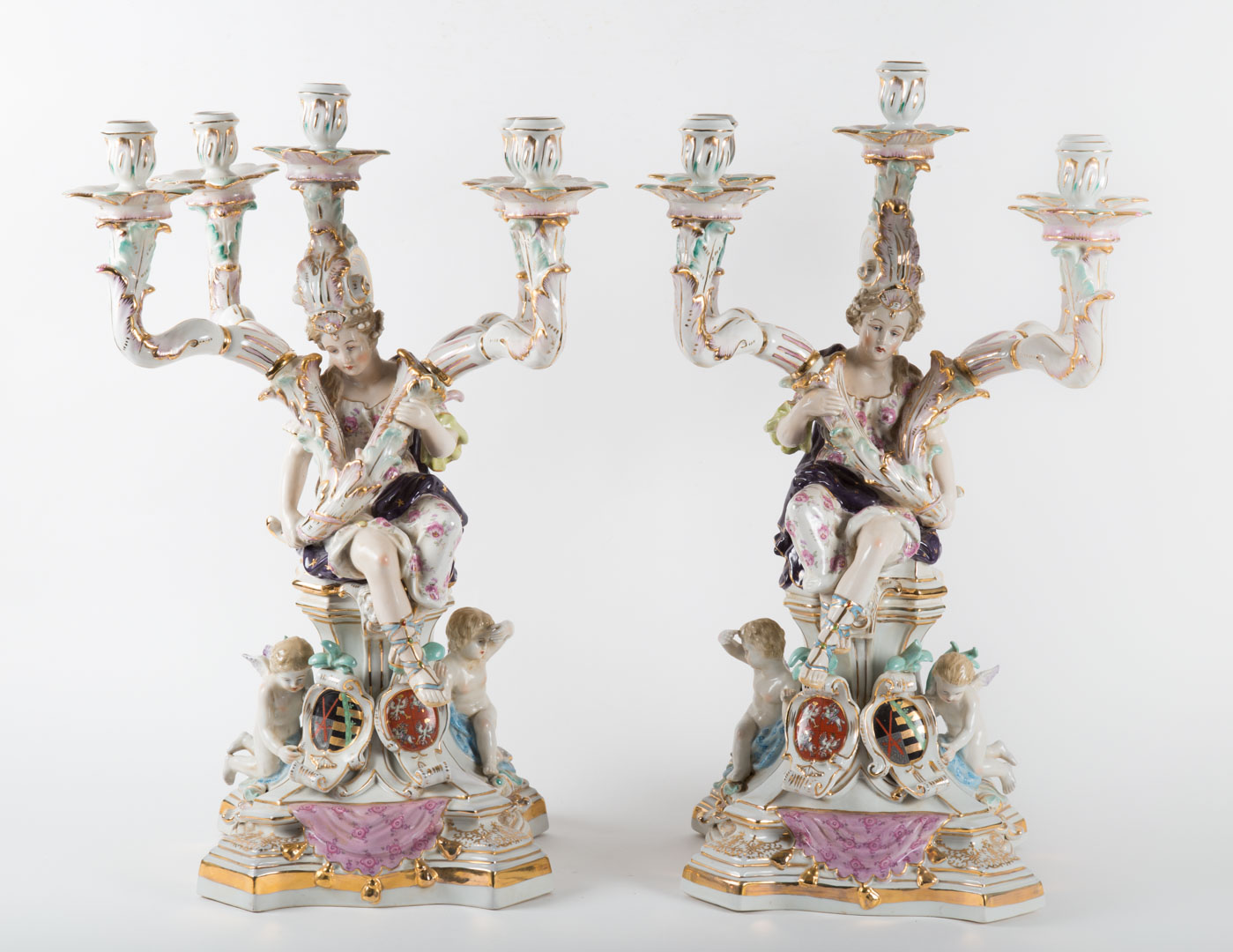 Appraisal: Pair Meissen style porcelain figural candelabra th century seated female