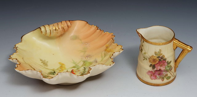 Appraisal: A Royal Worcester shell dishpainted with thistles pattern and a