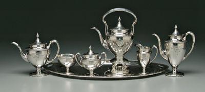 Appraisal: Sterling tea service tray urn form bodies with helmet-form rims