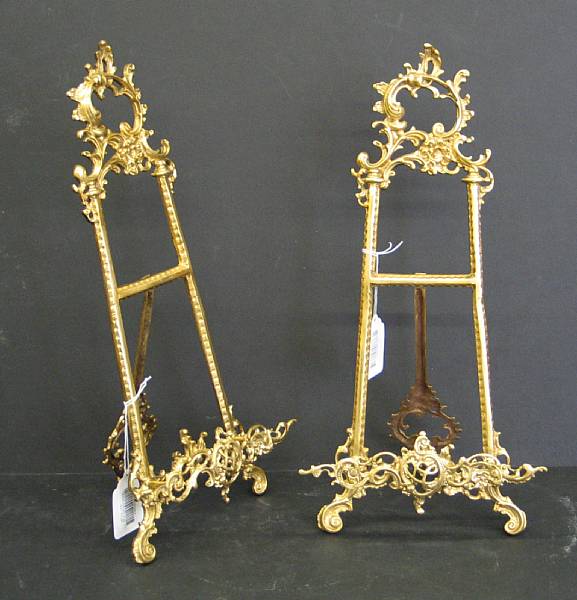 Appraisal: A pair of Rococo style cast brass easels modern height