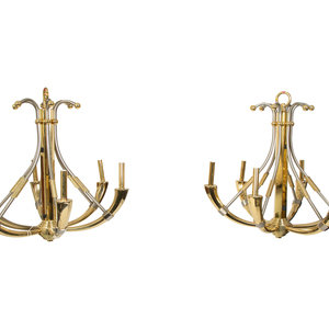 Appraisal: A Pair of Steel and Brass Chandeliers by Maison Jansen