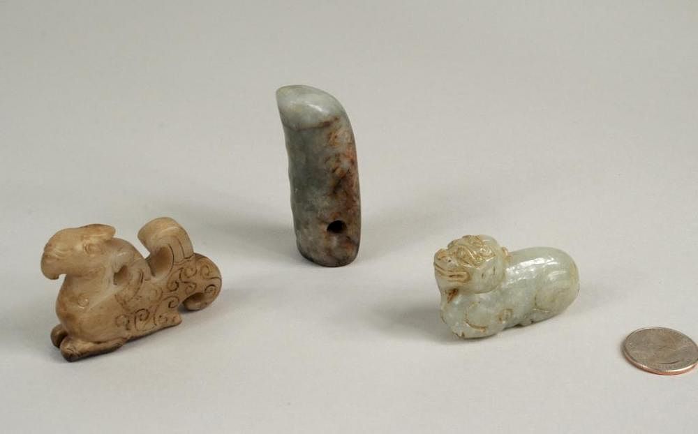 Appraisal: Three Chinese Carved Jade Pendants Three Chinese carved jade pendants