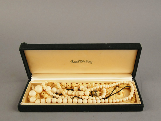 Appraisal: A Lot of Early Ivory Jewelry a graduated bead necklace