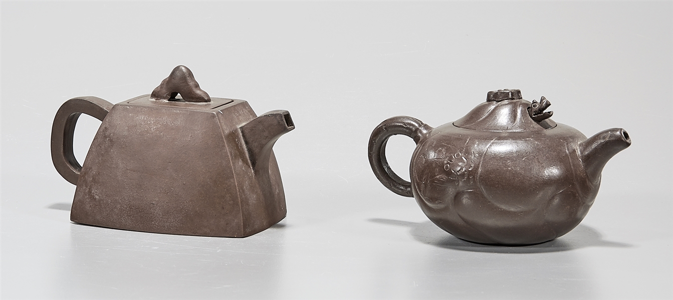 Appraisal: Two Chinese Yixing pottery tea pots one with mark x