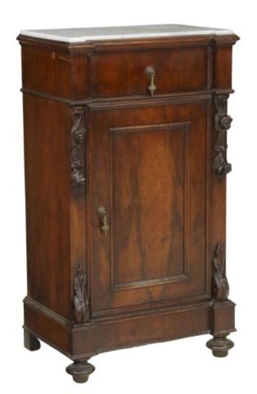 Appraisal: Italian walnut bedside cabinet th c shaped marble top over