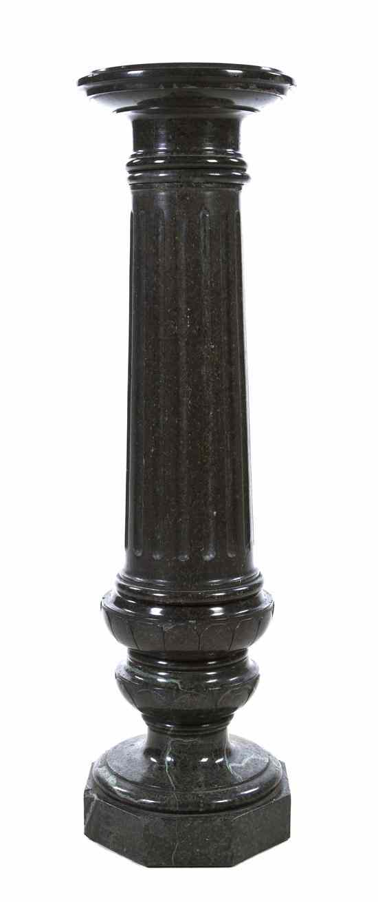 Appraisal: A Continental Marble Pedestal having a circular top over a