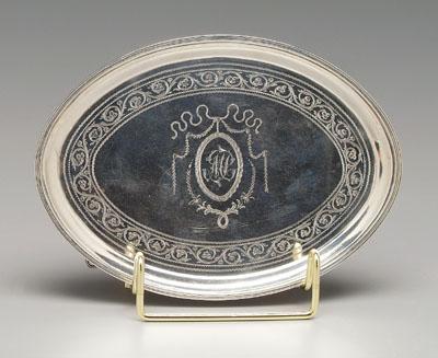 Appraisal: English silver tray oval with bright-cut engraved border central ribbon