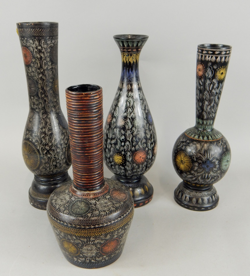 Appraisal: Four Indian style lacquered vases decorated with geometric devices leaves