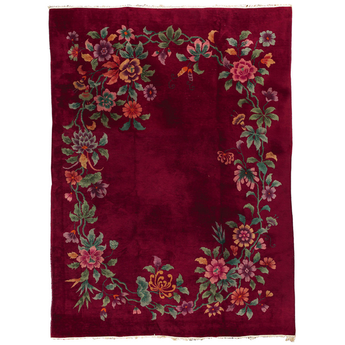 Appraisal: Chinese Deco rug c stylized floral design on a maroon