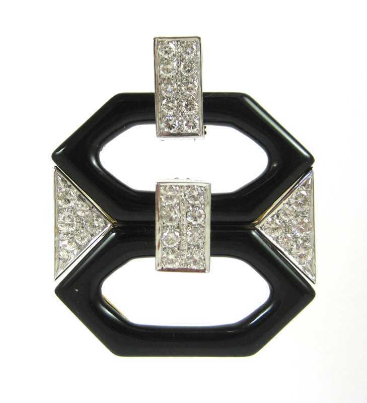 Appraisal: ART DECO DIAMOND AND BLACK ONYX PENDANT The flexible k