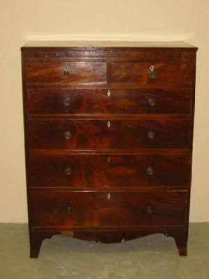 Appraisal: A GEORGE III MAHOGANY CHEST crossbanded with stringing reeded edged