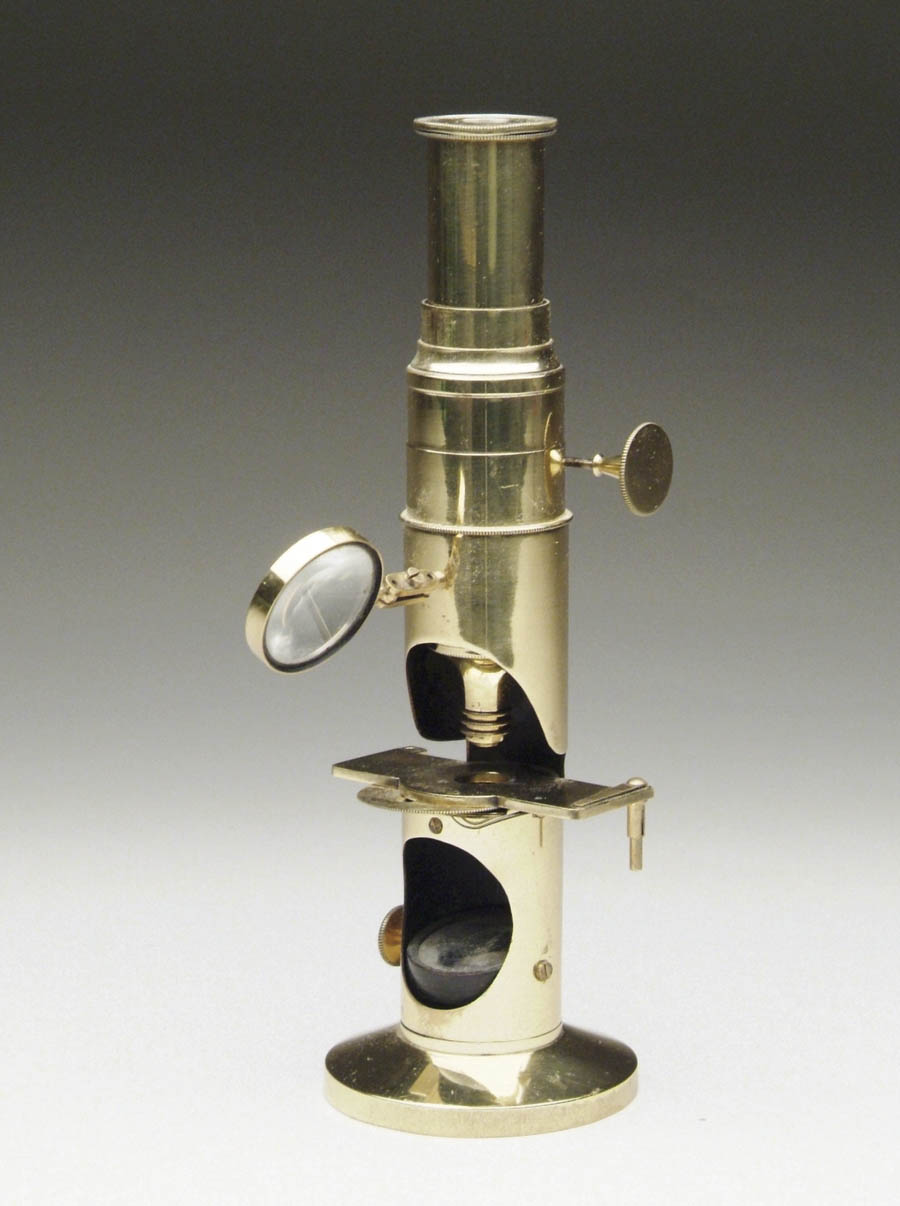 Appraisal: SMALL BRASS MICROSCOPE Intricate construction with adjustable lens tray to