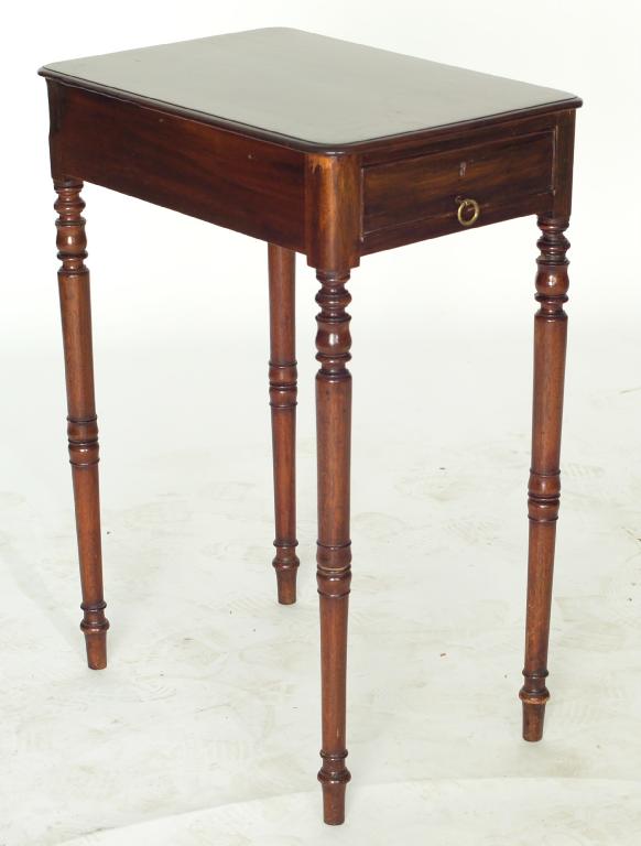 Appraisal: REGENCY MAHOGANY OCCASIONAL TABLE the rounded rectangular top above a