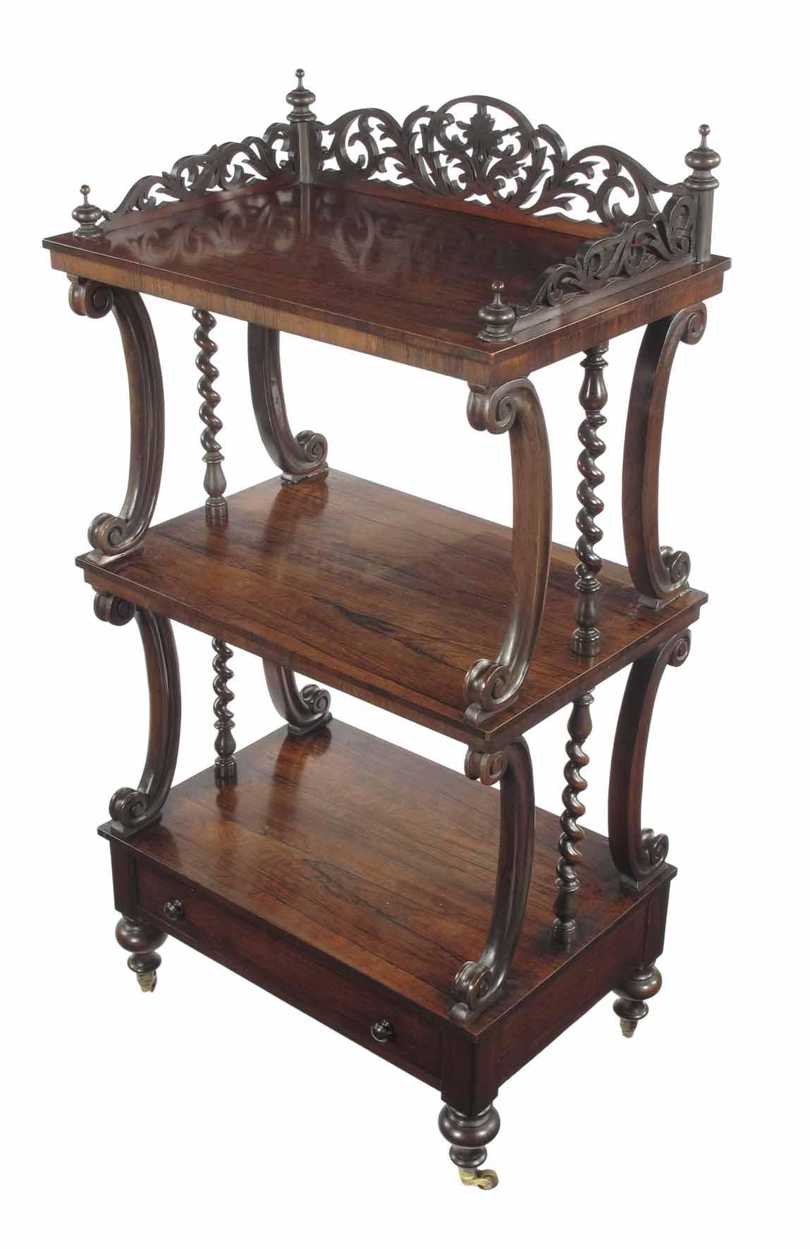 Appraisal: A Victorian rosewood three tier etagere