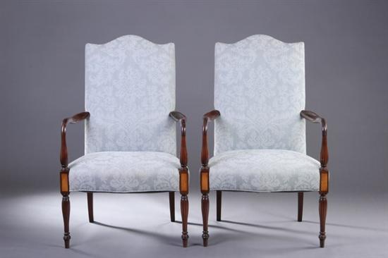 Appraisal: PAIR FEDERAL STYLE LOLLING CHAIRS th century Serpentine padded high