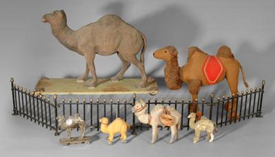 Appraisal: Six camel toys Steiff camel on wheels applied beige mohair