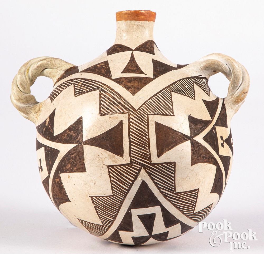 Appraisal: Acoma Pueblo Indian pottery canteen ca Acoma Pueblo Indian pottery